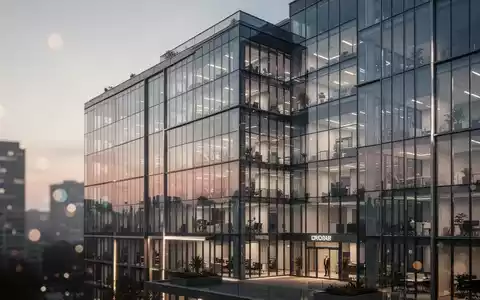 Modernes Bürogebäude der Ovag-Gruppe bei Dämmerung als Symbol für Unternehmensführung und rechtliche Aufsicht. - Foto: über boerse-global.de