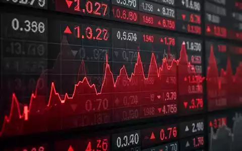 Abstrakte Darstellung fallender Aktienkurse auf einer digitalen Anzeigetafel in düsteren Farben. - Foto: über boerse-global.de