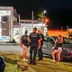 Ermittler der Polizei stehen am Einsatzort. - Bild: Fotoreport-DB/dpa