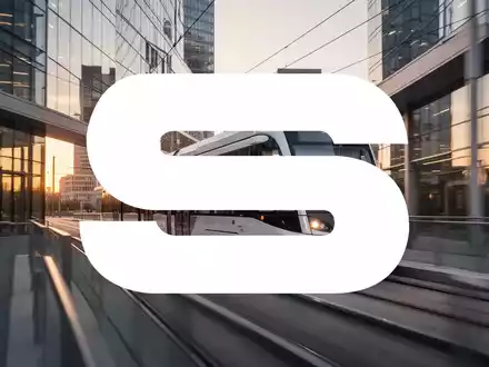 Moderne Stadtbahn fährt in einer zeitgenössischen städtischen Umgebung bei Dämmerung. - Foto: über boerse-global.de