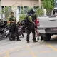 Die Polizei war mit einem Großaufgebot im Einsatz. - Bild: Sakchai Lalit/AP/dpa