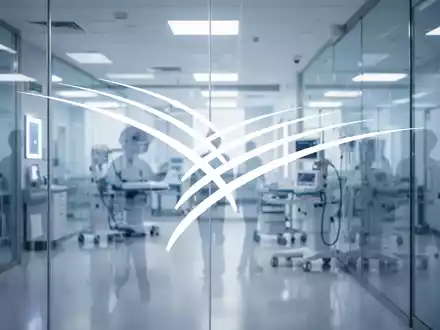 Moderne, sterile medizinische Einrichtung in kühlem Licht als Symbol für strategische Investitionen im Gesundheitssektor - Foto: über boerse-global.de