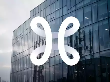 Abstrakte Darstellung moderner Büroarchitektur in kühlen Blautönen, passend zum Thema Telekommunikationssektor. - Foto: über boerse-global.de