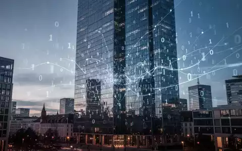 Ein modernes deutsches Stadtbild mit einem glĂ€sernen Wolkenkratzer, der digitale Datenströme und Netzwerke reflektiert. - Foto: ĂŒber boerse-global.de