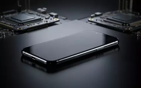 Nahaufnahme eines hochwertigen Smartphones auf einer reflektierenden Oberfläche, umgeben von technischer Industrie-Ästhetik. - Foto: über boerse-global.de
