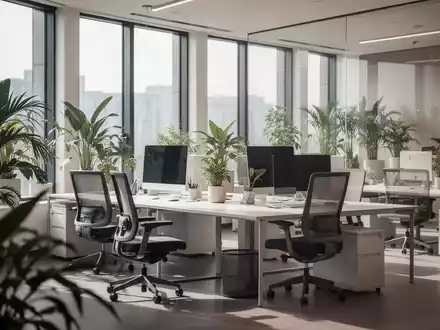Ein heller, modern gestalteter Büroarbeitsplatz mit ergonomischen Möbeln und Pflanzen für eine entspannte Arbeitsatmosphäre. - Foto: über boerse-global.de
