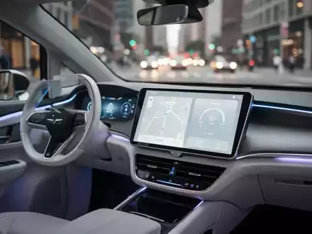 Innenansicht eines modernen autonomen Robotaxis mit schlankem digitalem Interface und minimalistischer Kabinengestaltung. - Foto: über boerse-global.de