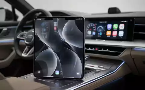 Modernes iPhone mit Benutzeroberfläche in einem technologisch fortschrittlichen Fahrzeuginnenraum. - Foto: über boerse-global.de