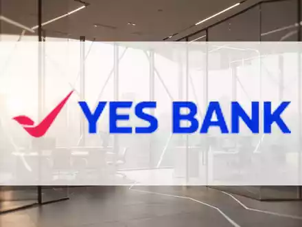 Moderne, minimalistische Bankarchitektur mit warmem Licht, die finanzielles Wachstum und Stabilität symbolisiert. - Foto: über boerse-global.de