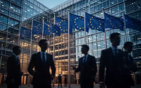 EU-Flaggen vor einem modernen Bürogebäude als Symbol für Beitrittsverhandlungen und regulatorische Compliance. - Foto: über boerse-global.de