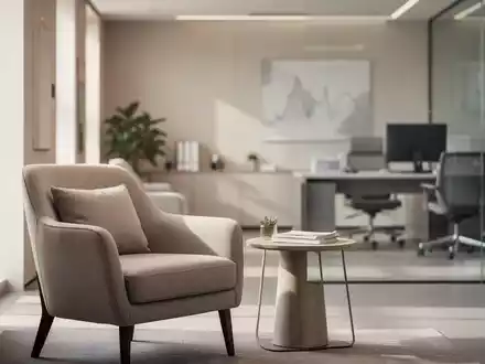 Modernes, helles Behandlungszimmer in einer Gesundheitseinrichtung mit minimalistischer Einrichtung und natürlichem Licht. - Foto: über boerse-global.de