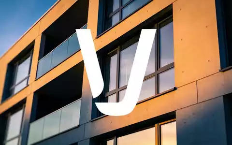 Moderne Wohnarchitektur in einer Stadt bei Dämmerungslicht als Symbol für den Immobilienmarkt. - Foto: über boerse-global.de