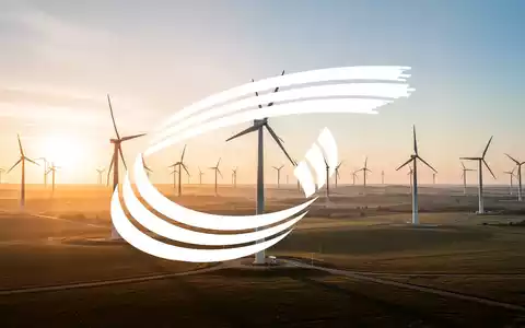 Moderne Windkraftanlagen in einer weiten, sonnigen Landschaft als Symbol für langfristige industrielle Finanzierung. - Foto: über boerse-global.de