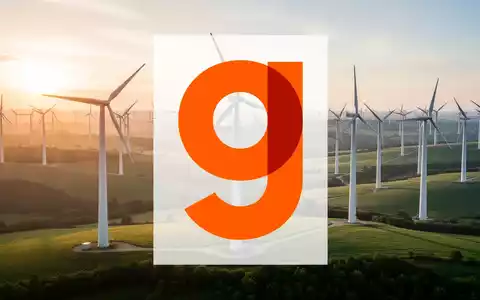 Moderne Windkraftanlagen in einer weiten Landschaft bei Sonnenuntergang als Symbol für Investitionen in erneuerbare Energien. - Foto: über boerse-global.de