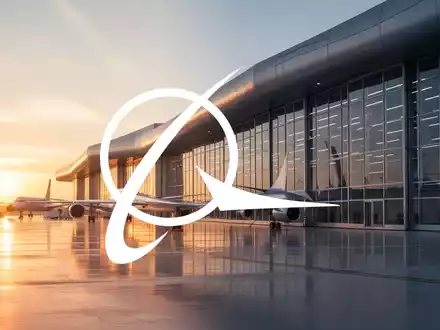 Moderne Luftfahrthalle bei Sonnenuntergang als Symbol für die Luftfahrtindustrie. - Foto: über boerse-global.de