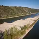 Das Niedrigwasser am Rhein macht sich auch an den Tankstellen bemerkbar. - Bild: Thomas Frey/dpa