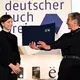 Im vergangenen Jahr ging der Buchpreis an Elmiger (Archivbild) - Bild: Arne Dedert/dpa