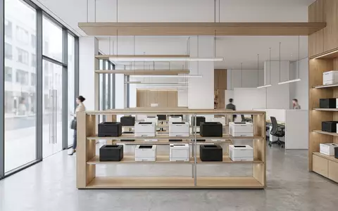 Architektur-Render im Bürofachhandel mit Bürodrucker zum Thema Kyocera Ecosys Drucker, ISIN JP3249600002, neutrales Tageslicht - Foto: THN