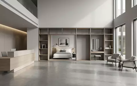 Architektur-Render im Hotellobby mit Hotelzimmer zum Thema Hilton Hotel, ISIN US43300A2033, neutrales Tageslicht - Foto: THN