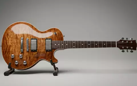 Fotorealistische Studioaufnahme von Elektrogitarre zum Thema Gibson . Ersatz, ISIN US30034W1060, klare Lichtfuehrung - Foto: THN
