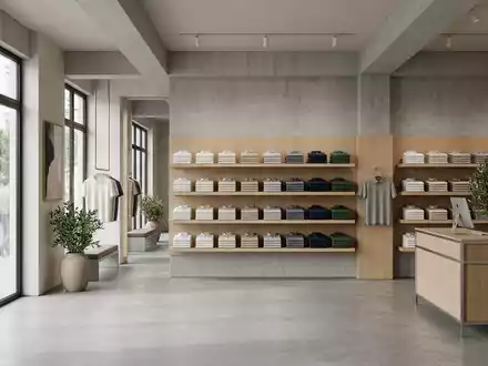 Architektur-Render im Bekleidungsgeschäft mit Kurzarm-Kragenhemd zum Thema Polo Ralph Lauren Shirt, ISIN US7512121010, neutrales Tageslicht - Foto: THN