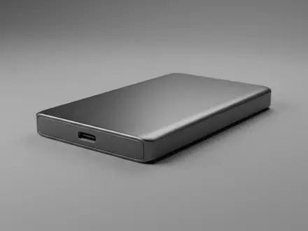 Fotorealistische Studioaufnahme von Externe SSD zum Thema WD My Passport SSD, ISIN US9581021055, klare Lichtfuehrung - Foto: THN