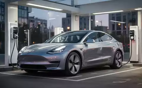 Modernes Elektroauto an einer Ladestation in einer minimalistischen Umgebung bei Dämmerung. - Foto: über boerse-global.de