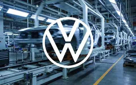 Abstrakte Darstellung einer modernen Automobilfertigung in kühler, gedämpfter Lichtstimmung. - Foto: über boerse-global.de