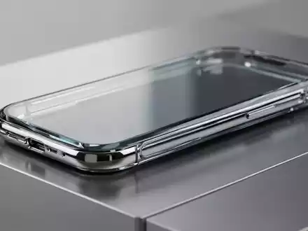 Ein hochwertiges Smartphone-Modell mit Glasgehäuse und Metallrahmen auf einer minimalistischen Oberfläche. - Foto: über boerse-global.de