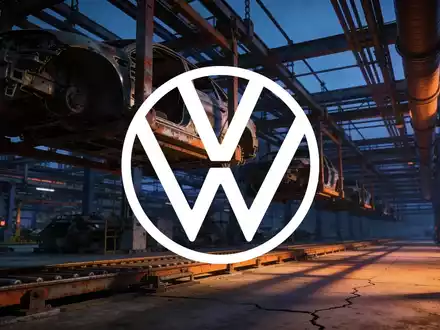 Düstere, atmosphärische Darstellung einer modernen Industriefabrik, die wirtschaftliche Unsicherheit symbolisiert. - Foto: über boerse-global.de