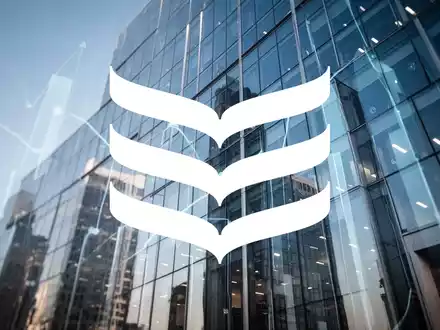 Moderne Glasfassade eines Bankgebäudes bei klarem Himmel als Symbol für Finanzwachstum und Stabilität. - Foto: über boerse-global.de