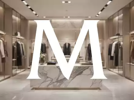 Elegantes, minimalistisches Interieur einer Luxus-Boutique in gedimmtem, atmosphärischem Licht. - Foto: über boerse-global.de