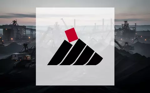 Industrielle Kohleumschlaganlage in atmosphärischem Dämmerlicht als Symbol für den Kohlesektor. - Foto: über boerse-global.de