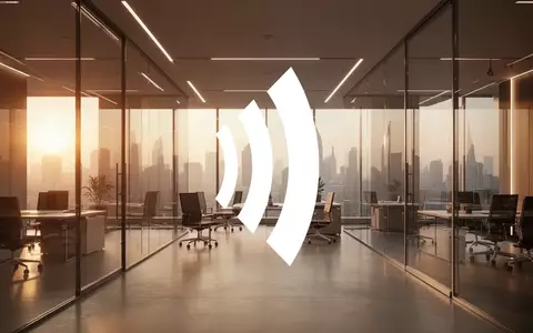 Abstrakte Darstellung eines modernen, professionellen Bürointerieurs in warmem Licht als Symbol für Unternehmensfinanzen. - Foto: über boerse-global.de