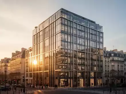 Modernes Bürogebäude bei Sonnenuntergang als Symbol für Immobilieninvestitionen - Foto: über boerse-global.de