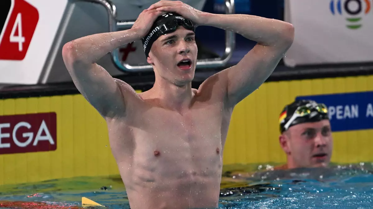 Johannes Liebmann verblüfft die Schwimm-Welt. - Bild: Emma Da Silva/AP/dpa