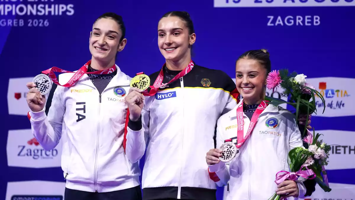Stolzes Lächeln: Helen Kevric mit ihrer Goldmedaille. - Bild: Igor Kralj/PIXSELL/dpa
