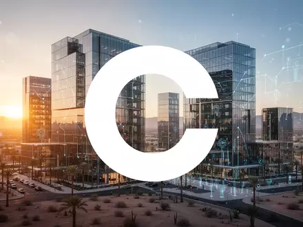 Moderne Glasarchitektur in einer Wüstenmetropole bei Dämmerung als Symbol für globale Finanztechnologie und Expansion. - Foto: über boerse-global.de
