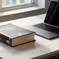 Ein Fachbuch zum EU AI Act liegt auf einem modernen Schreibtisch neben einem Laptop in einer hellen Büroumgebung. - Foto: über boerse-global.de