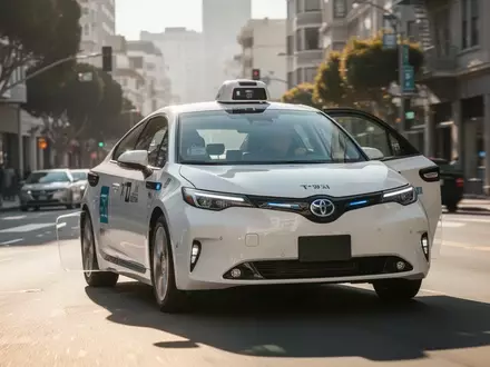 Ein autonomes Taxi fährt bei Tageslicht durch eine städtische Umgebung in San Francisco. - Foto: über boerse-global.de