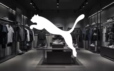 Abstrakte Darstellung eines modernen Sportartikelgeschäfts mit hochwertigen Textilien und minimalistischem Design. - Foto: über boerse-global.de