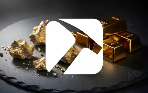 Edelmetallbarren und Golderz auf dunklem Steinuntergrund als Symbol für den Bergbausektor. - Foto: über boerse-global.de