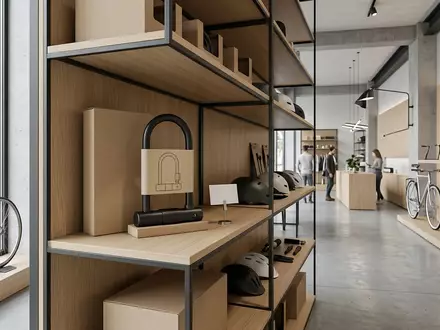 Architektur-Render im Fahrradladen mit Buegelschloss zum Thema Abus Granit X-Plus 540, neutrales Tageslicht - Foto: THN