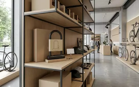 Architektur-Render im Fahrradladen mit Buegelschloss zum Thema Abus Granit X-Plus 540, neutrales Tageslicht - Foto: THN