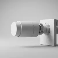Fotorealistische Studioaufnahme von Heizkoerperthermostat zum Thema Danfoss Ally Heizkörperthermostat Smart, klare Lichtfuehrung - Foto: THN