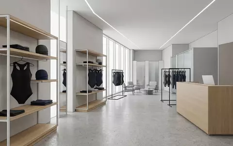 Architektur-Render im Bademodengeschaeft mit Badeanzug zum Thema Nike Damen Hydrastrong Solid, neutrales Tageslicht - Foto: THN