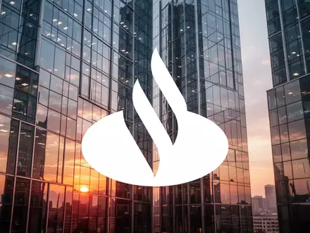 Modernes Glasgebäude bei Sonnenuntergang als Symbol für Stabilität und Wachstum im Finanzsektor. - Foto: über boerse-global.de