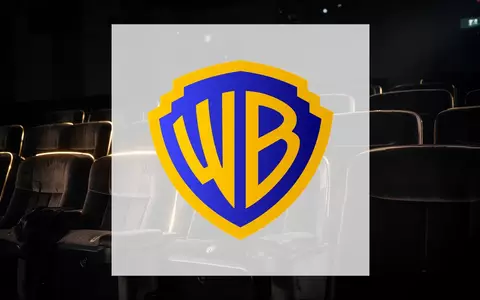 Atmosphärischer, dunkler Kinosaal mit samtenen Sitzen und stimmungsvoller Beleuchtung als Symbol für die Filmbranche. - Foto: über boerse-global.de