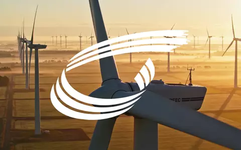 Moderne Windkraftanlagen in einem sonnendurchfluteten Windpark bei Sonnenaufgang. - Foto: über boerse-global.de