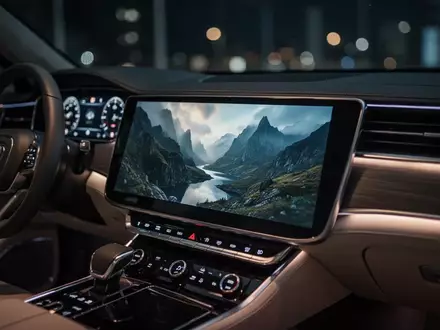 Innenraum eines modernen Autos bei Nacht mit Fokus auf ein leuchtendes Infotainment-Display in der Mittelkonsole. - Foto: über boerse-global.de